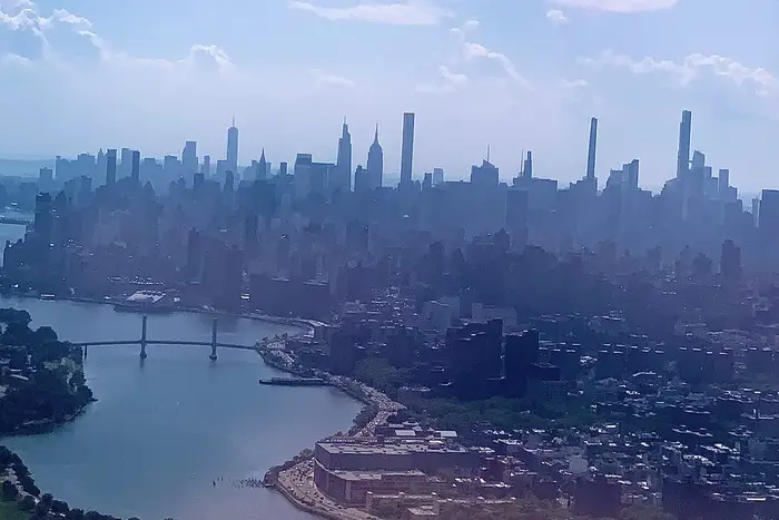 The Manhattan skyline as seen from a plane descending into LaGuardia.